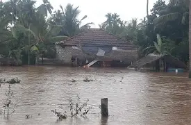 வெள்ளத்தில் அடித்துச் செல்லப்பட்ட தம்பதி – மனைவி சடலமாக மீட்பு, கணவர் காணாமல் போன்